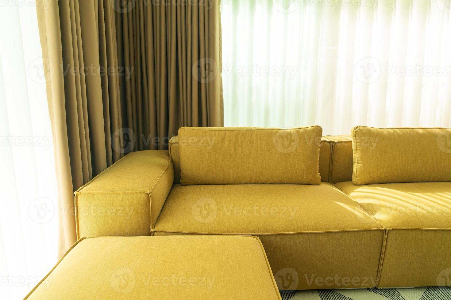Empty golden mustard sofa in living room photo