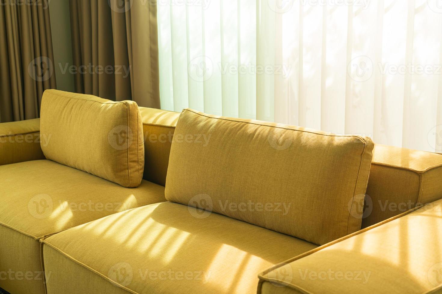 Empty golden mustard sofa in living room photo