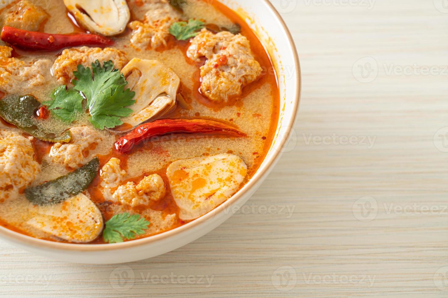 Spicy boiled pork soup with mushroom - Tom Yum - Asian food style photo