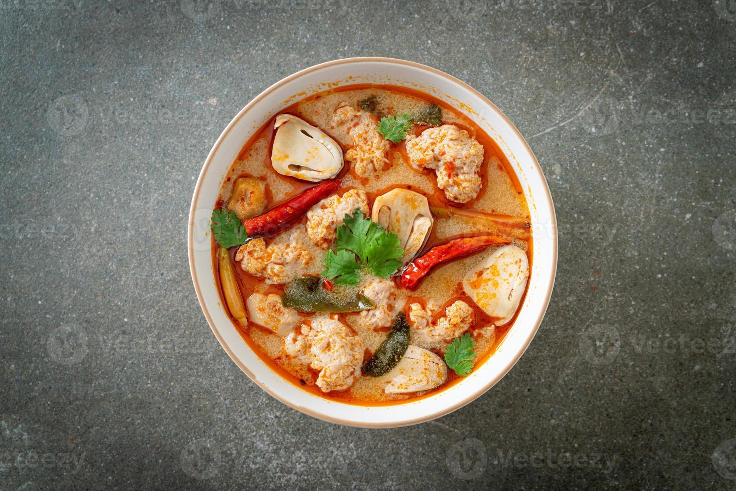 Spicy boiled pork soup with mushroom - Tom Yum - Asian food style photo