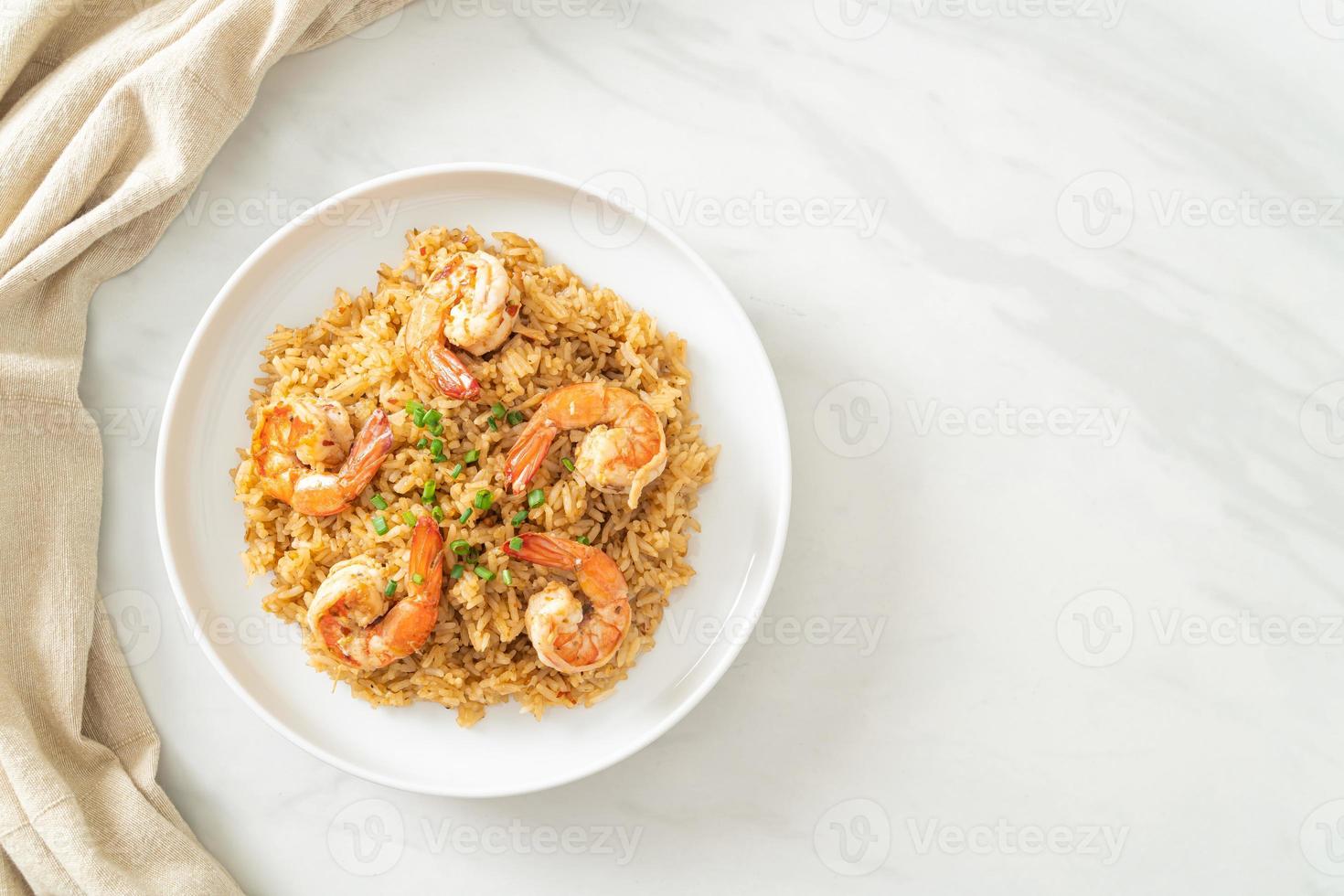 Garlic fried rice with shrimps or prawns photo