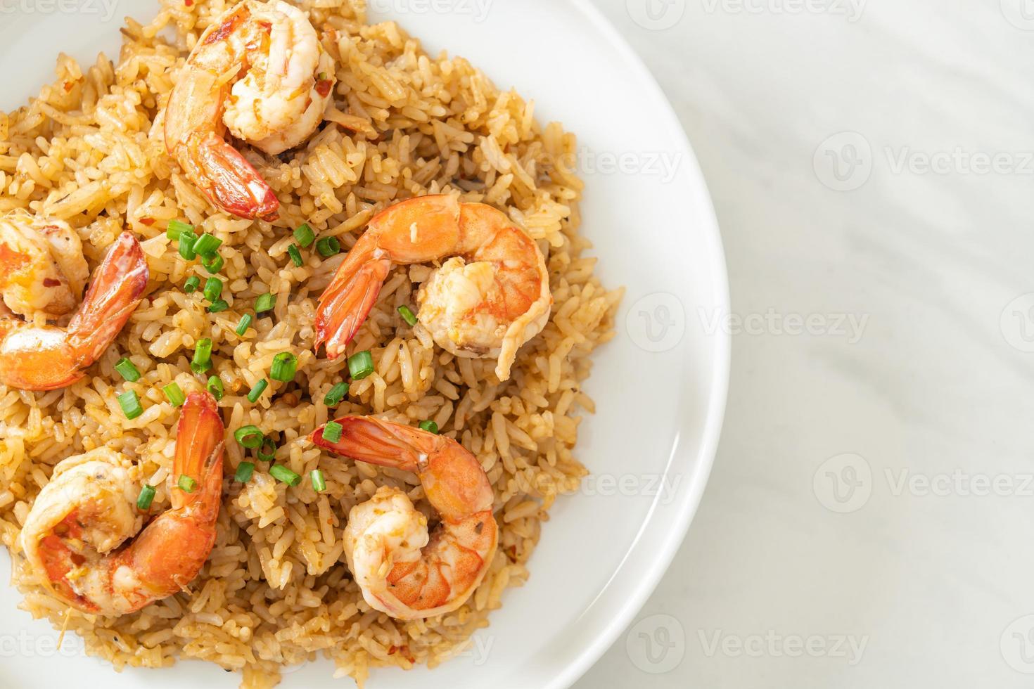 Garlic fried rice with shrimps or prawns photo