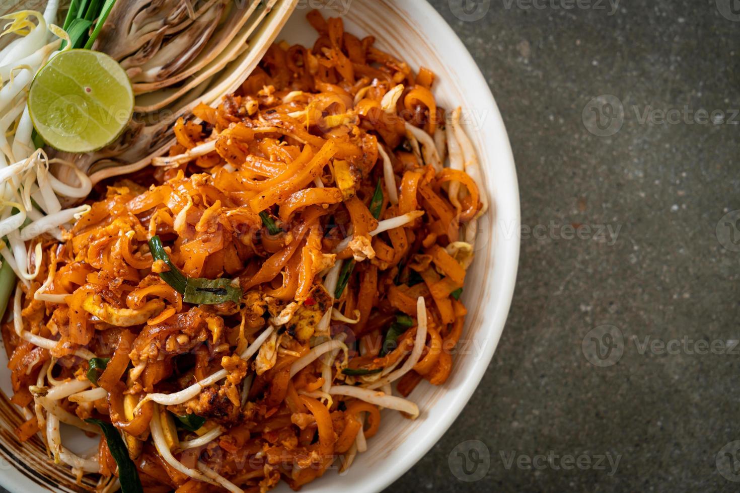 Stir-fried noodle with tofu and sprouts or Pad Thai - Asian food style photo