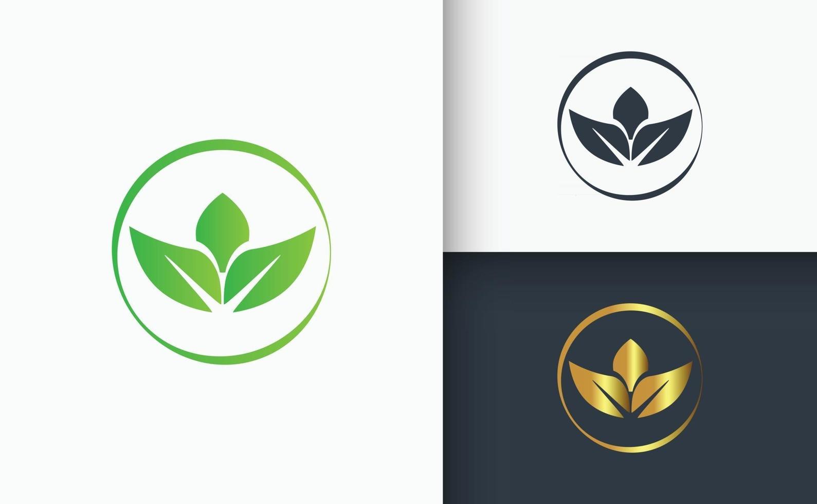 diseño de logotipo natural hoja verde dorada y negra vector