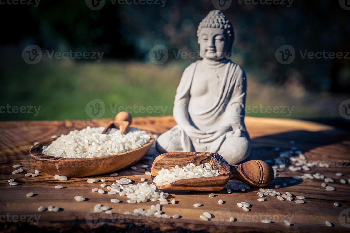 Sushi rice on olive wood photo