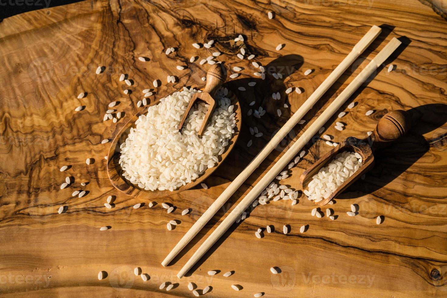 Sushi rice on olive wood photo