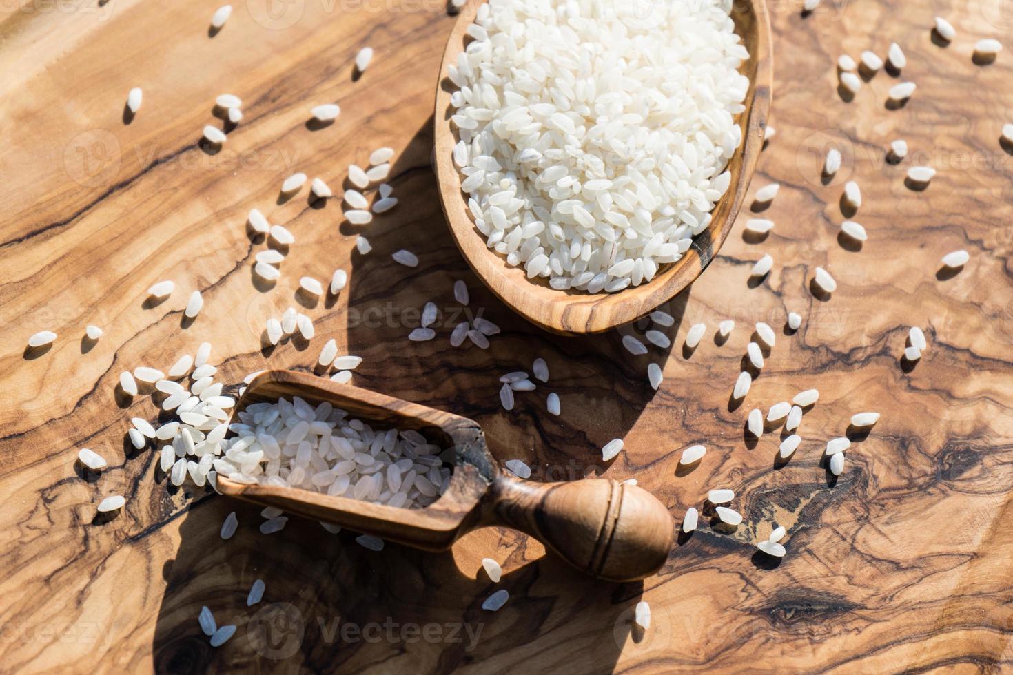 Sushi rice on olive wood photo