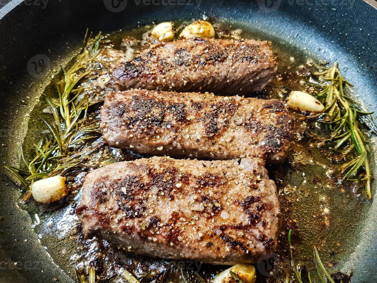 Rosemary lamb steaks with garlic photo