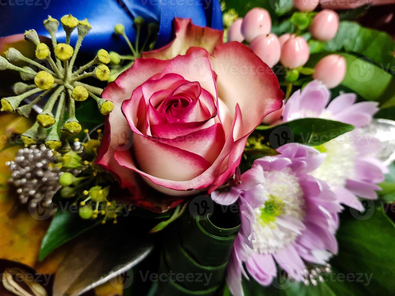 Bridal bouquet with different flowers photo