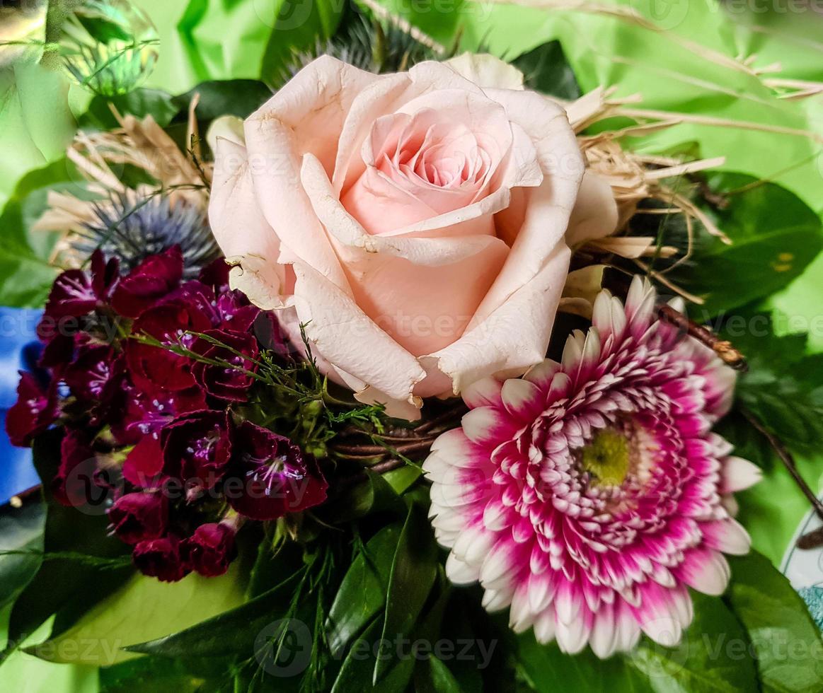 Bridal bouquet with different flowers photo