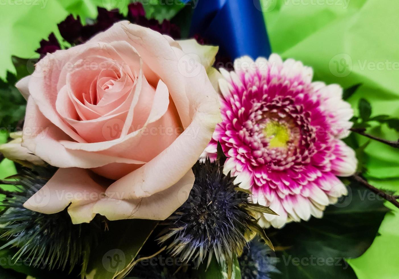 Bridal bouquet with different flowers photo