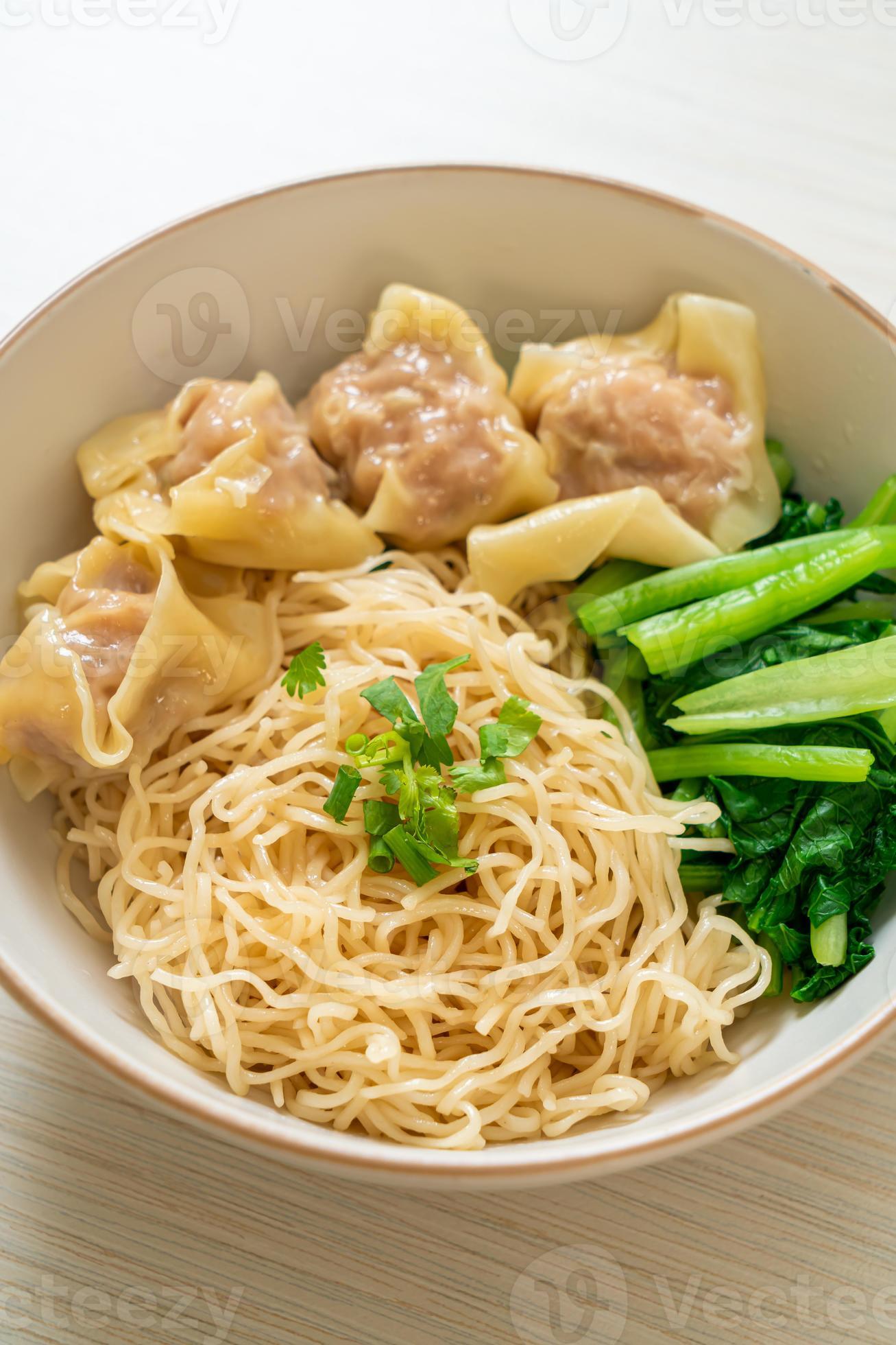 Dried egg noodles with pork wonton or pork dumplings without soup Asian