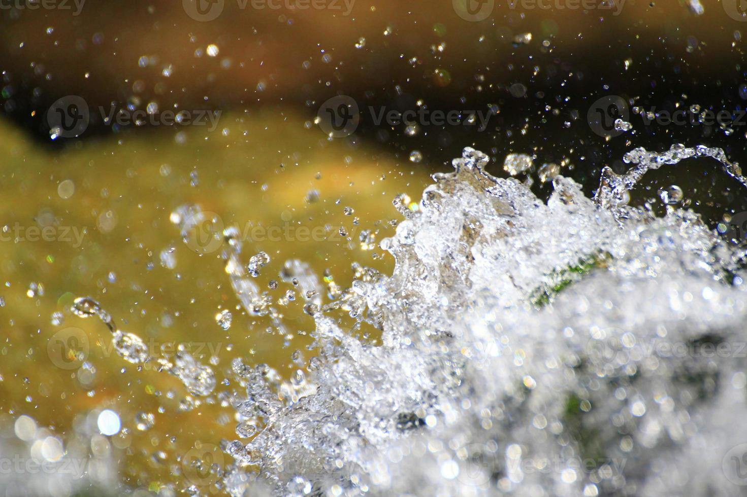 Drops of water from the waterfall photo