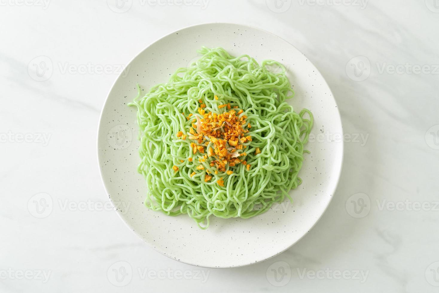 Green jade noodle with garlic on plate photo