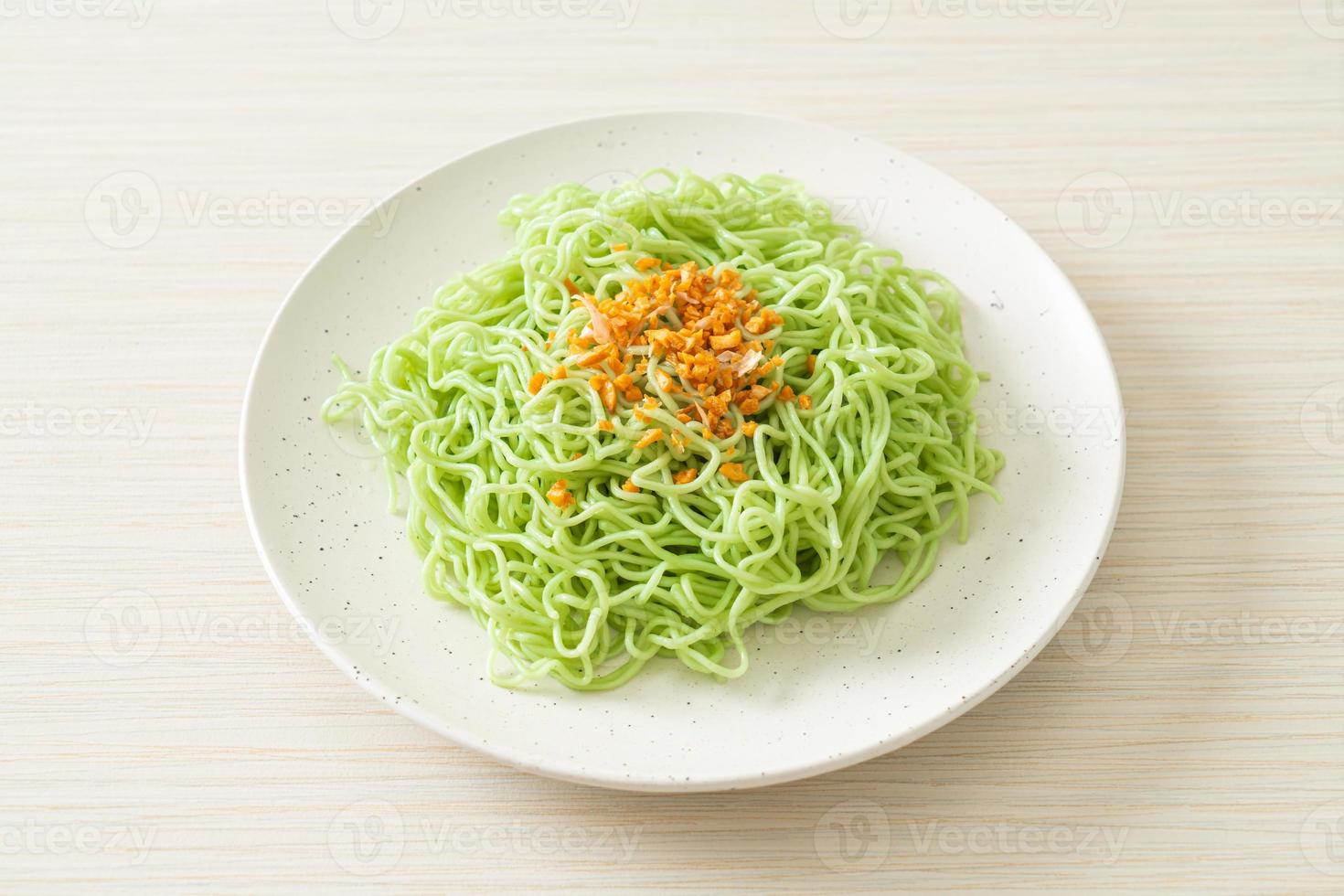 Green jade noodle with garlic on plate photo