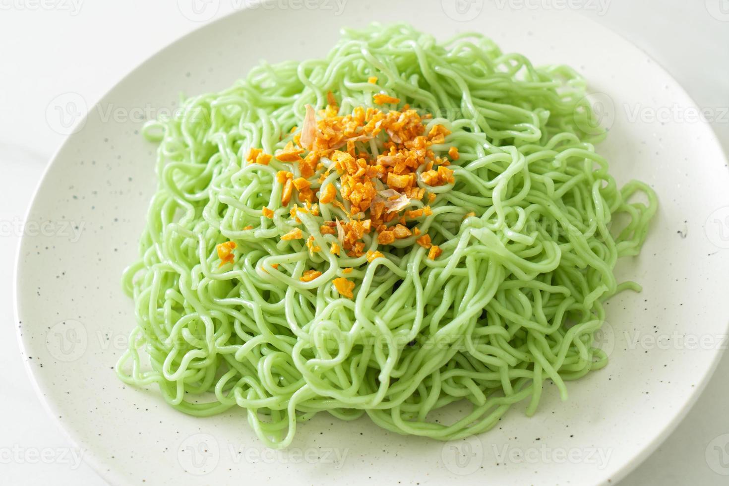 Green jade noodle with garlic on plate photo