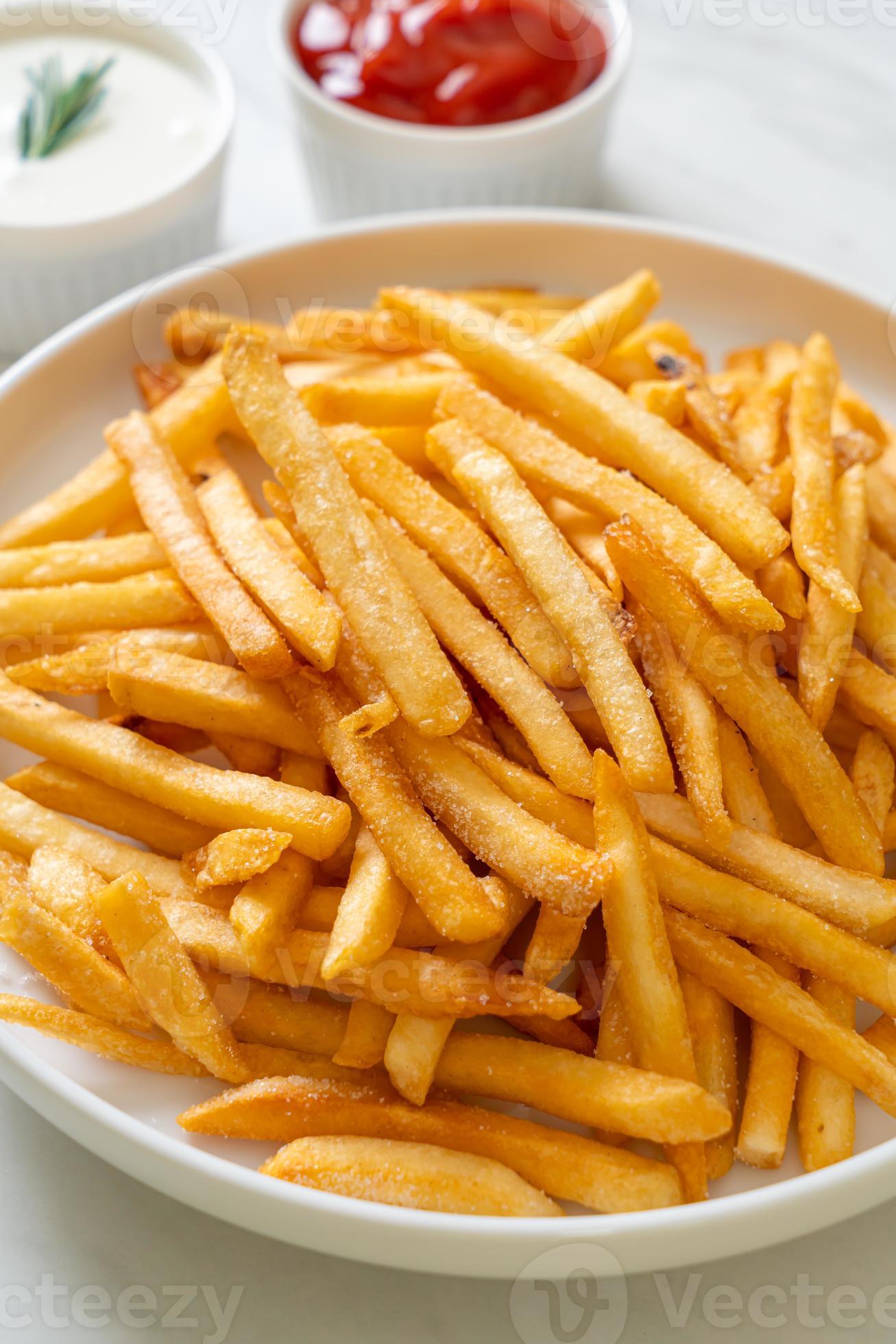 French fries with sour cream and ketchup 3011359 Stock Photo at Vecteezy