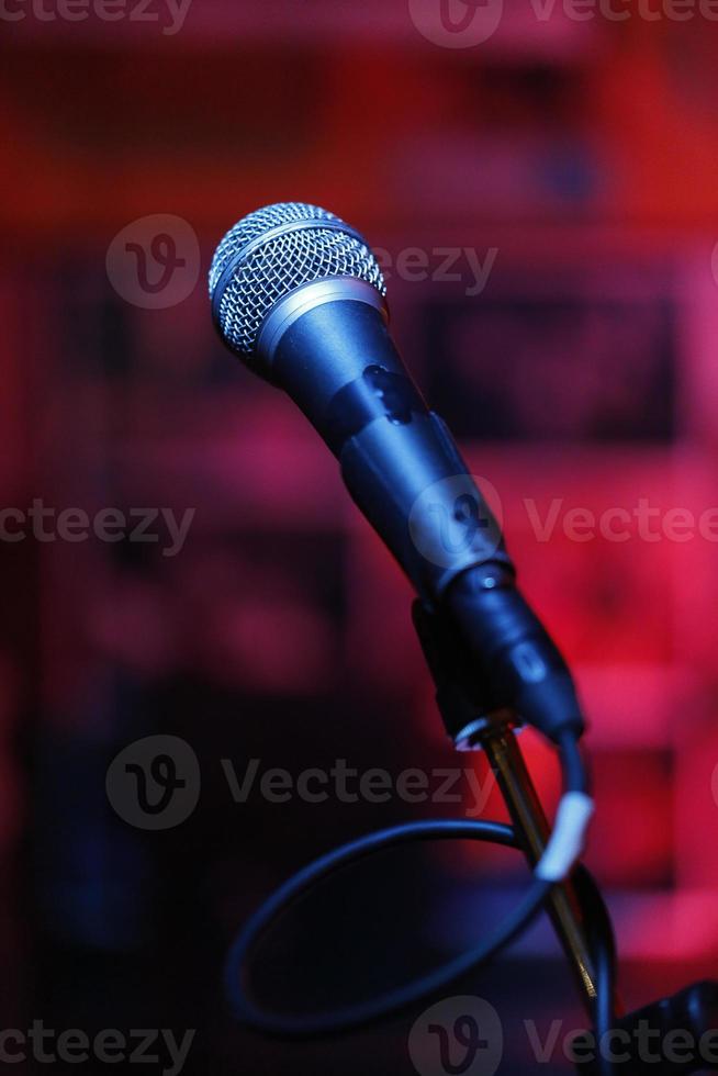 Microphone on a red background photo