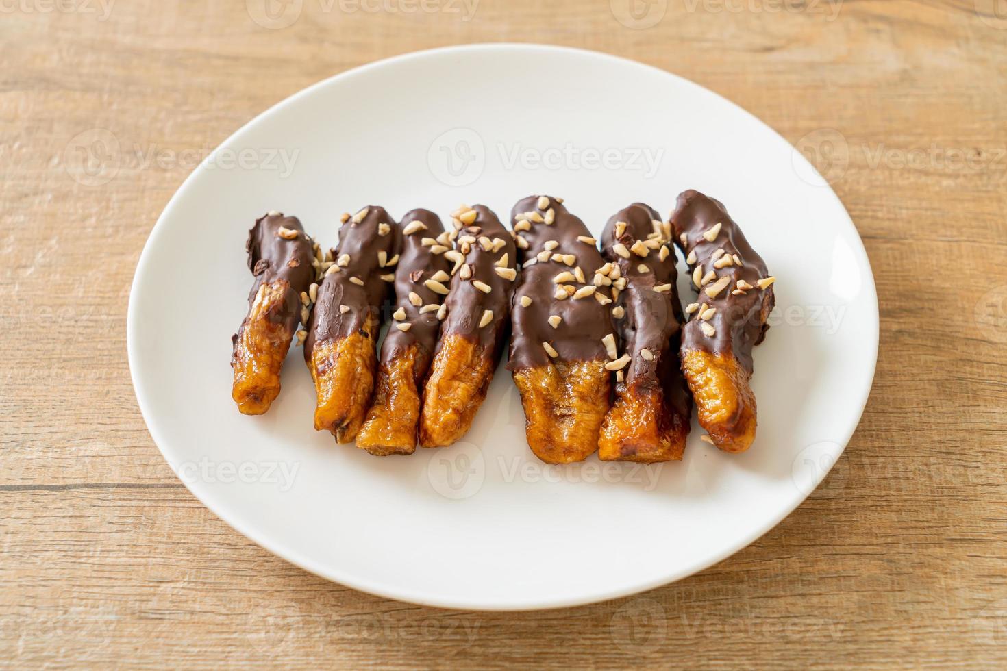 Solar sun dried banana chocolate coating or banana dipped chocolate photo