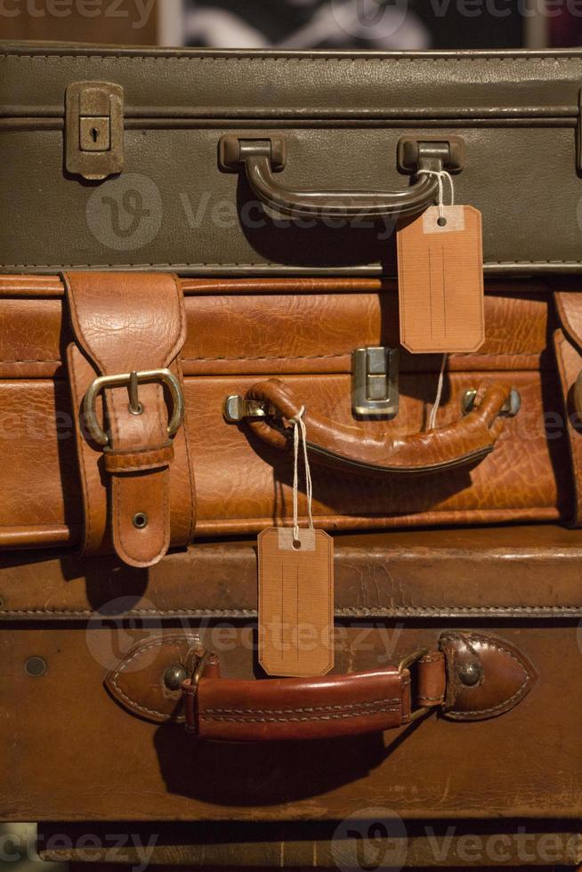 Stack of vintage leather suitcases photo