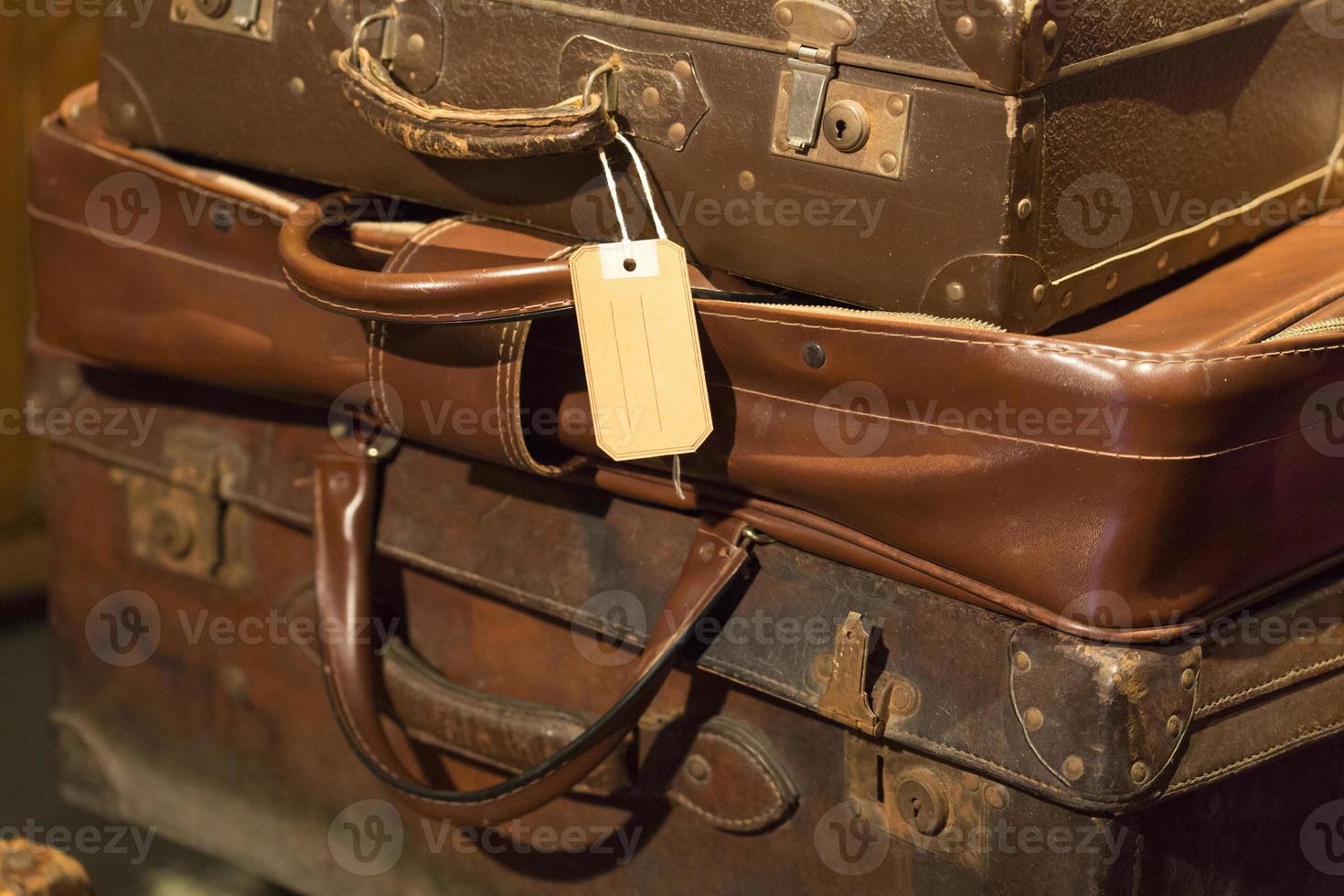 Stack of vintage leather suitcases photo