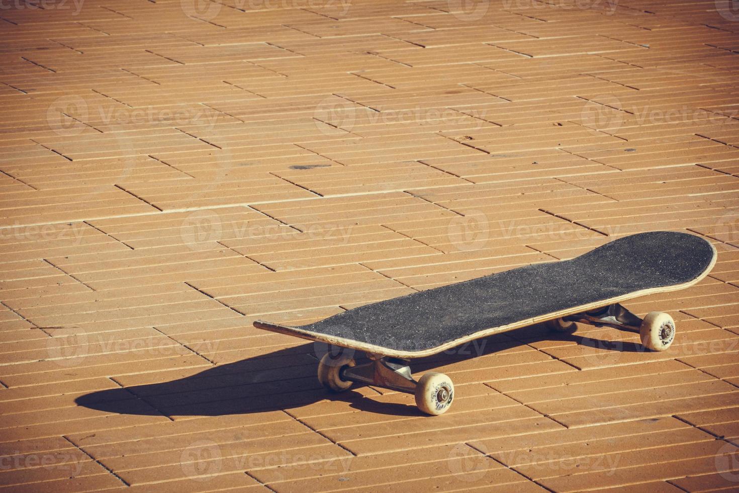 Skateboard and shadow photo