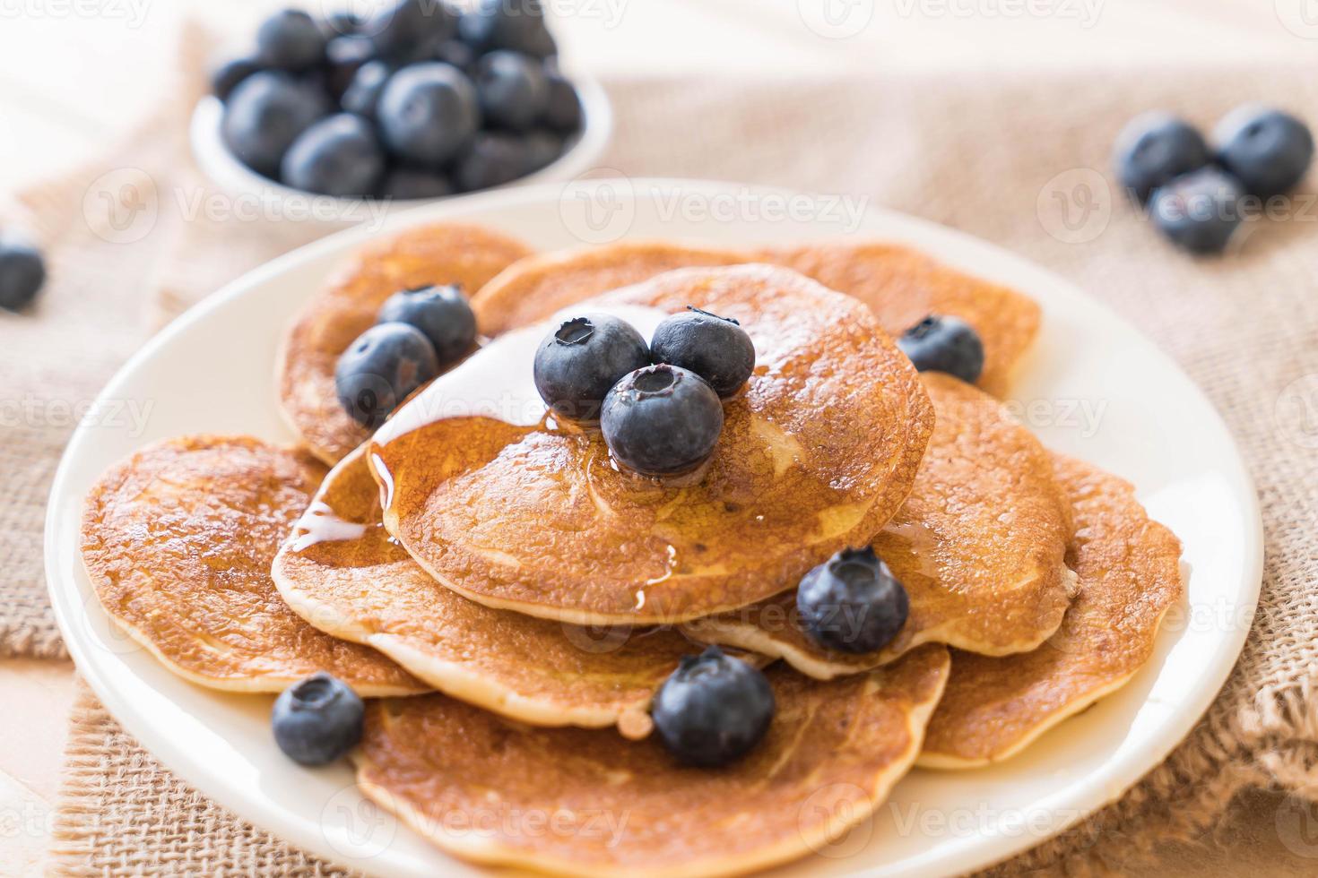 Stack of pancakes with fresh blueberry photo