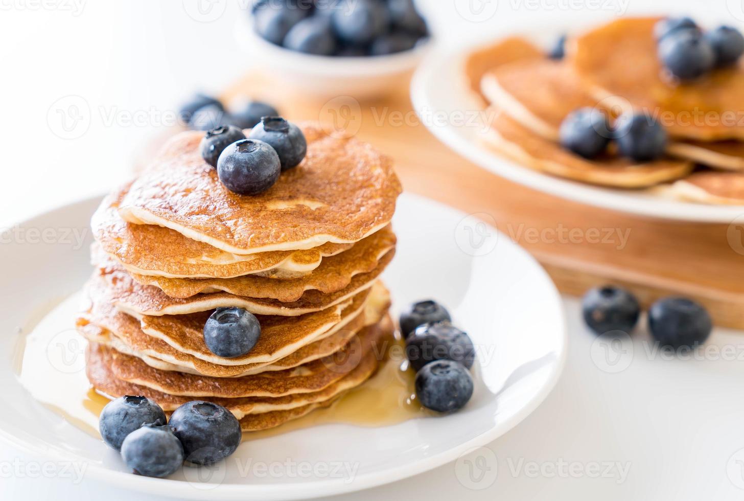 Stack of pancakes with fresh blueberry photo