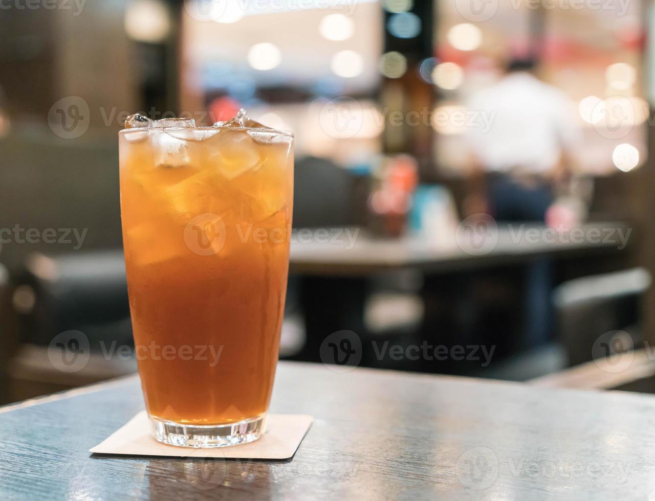 Iced lemon tea on the table photo