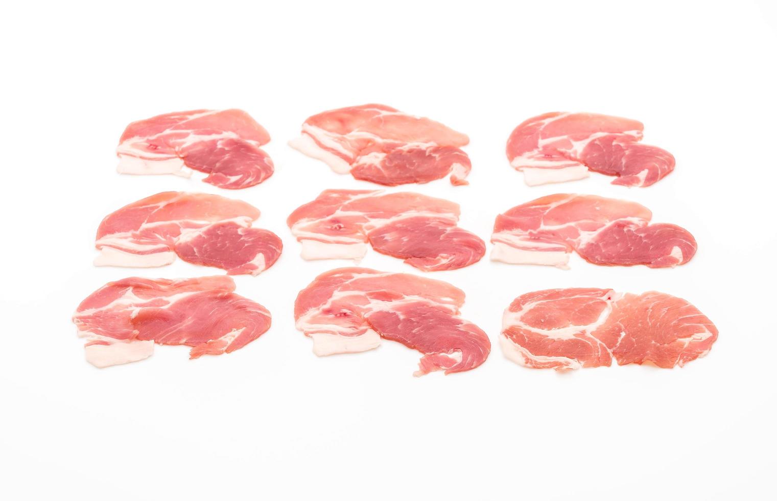 Fresh pork sliced on white background photo