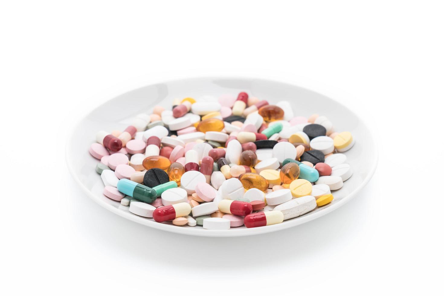 Colorful capsules and pills photo