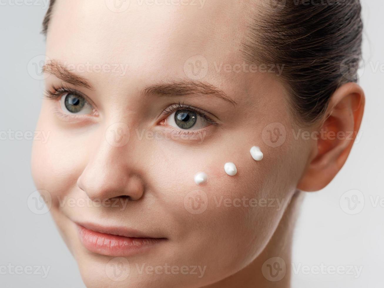 Beautiful Young Woman with Clean Fresh Skin photo