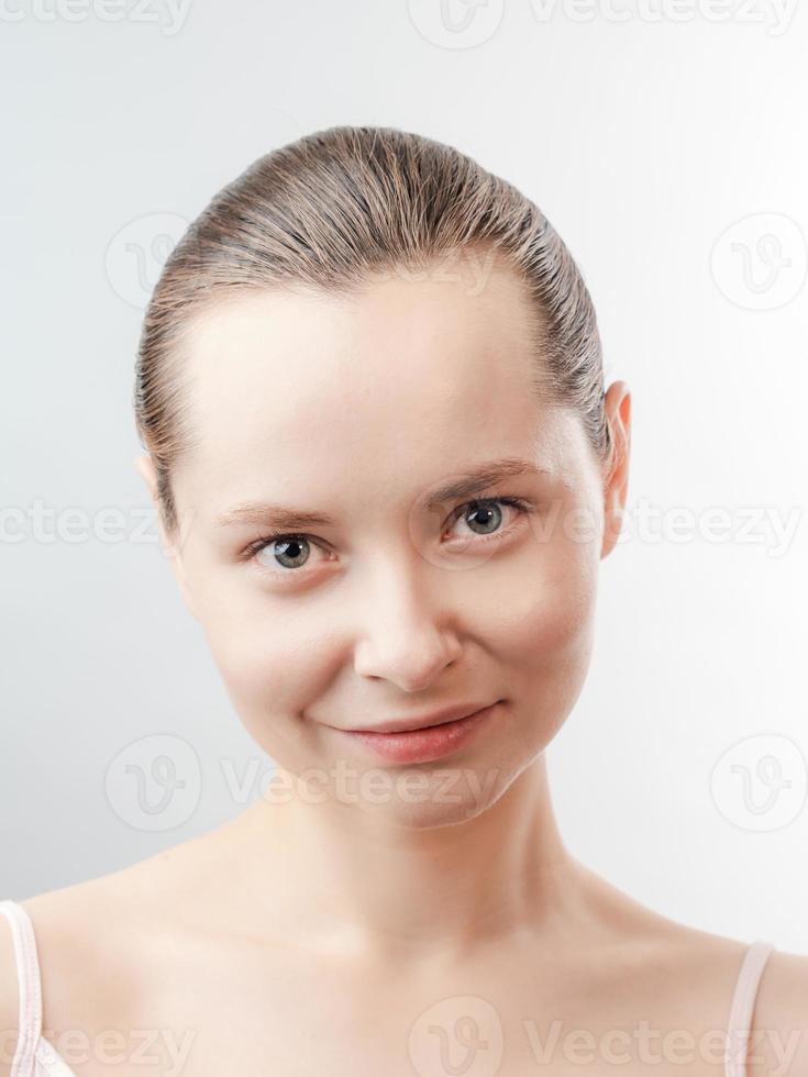 Beautiful Young Woman with Clean Fresh Skin photo