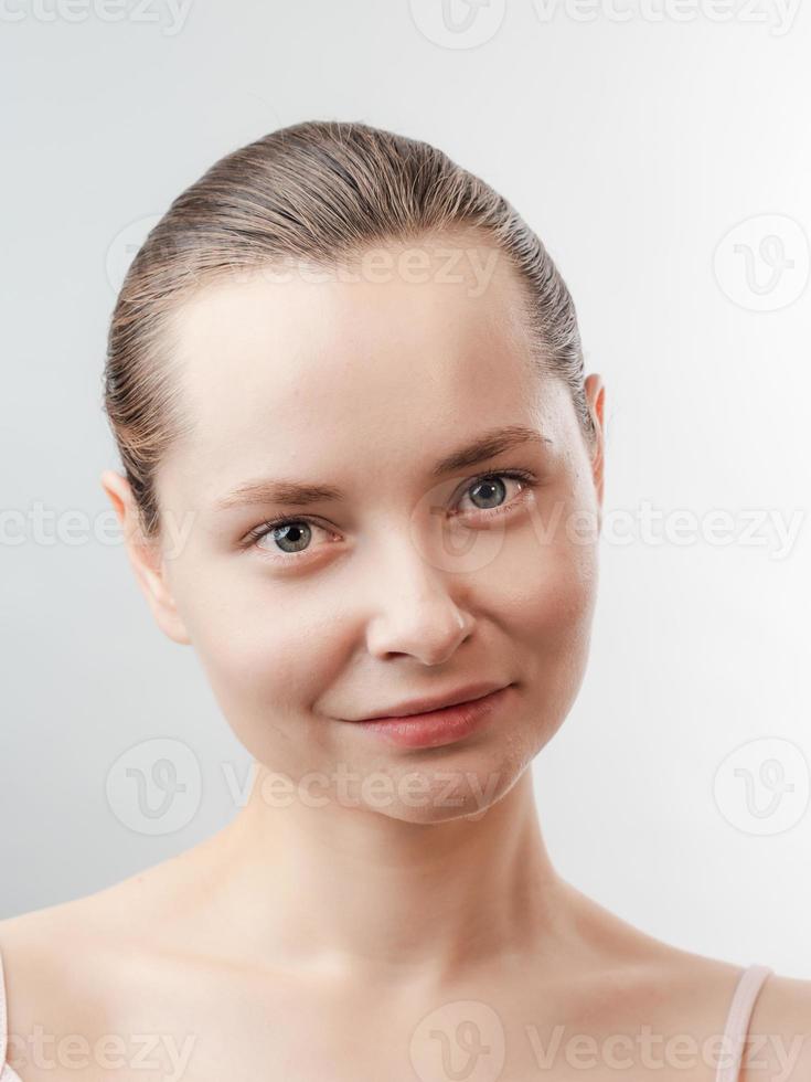 Beautiful Young Woman with Clean Fresh Skin photo