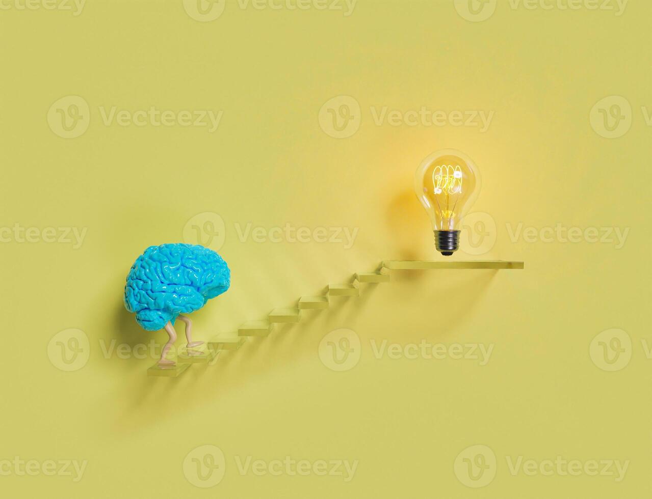 brain climbing stairs to a light bulb photo