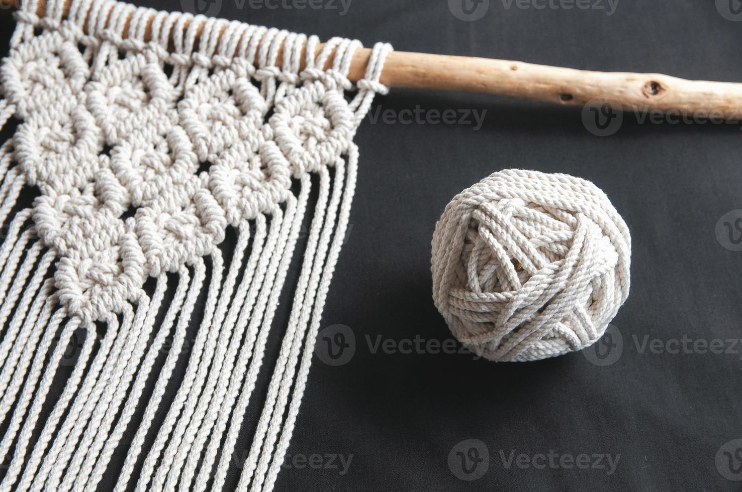 Decorative handmade stylish cotton macrame decoration, hobby interior photo