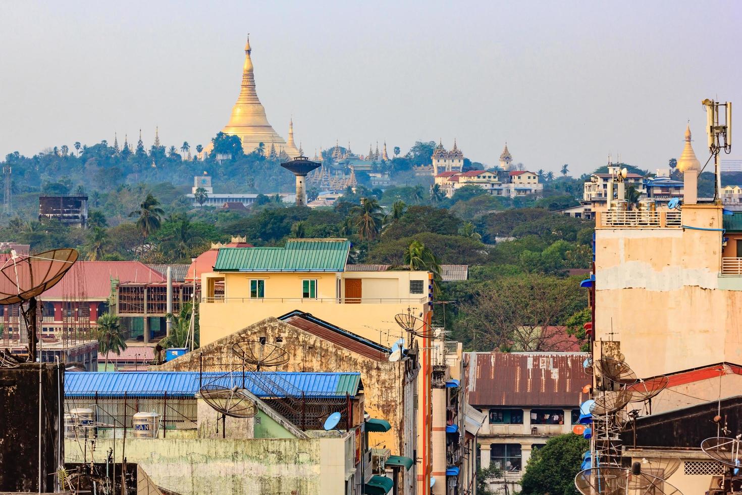 Yangon, Myanmar city skyline with Shwedagon Pagoda. photo