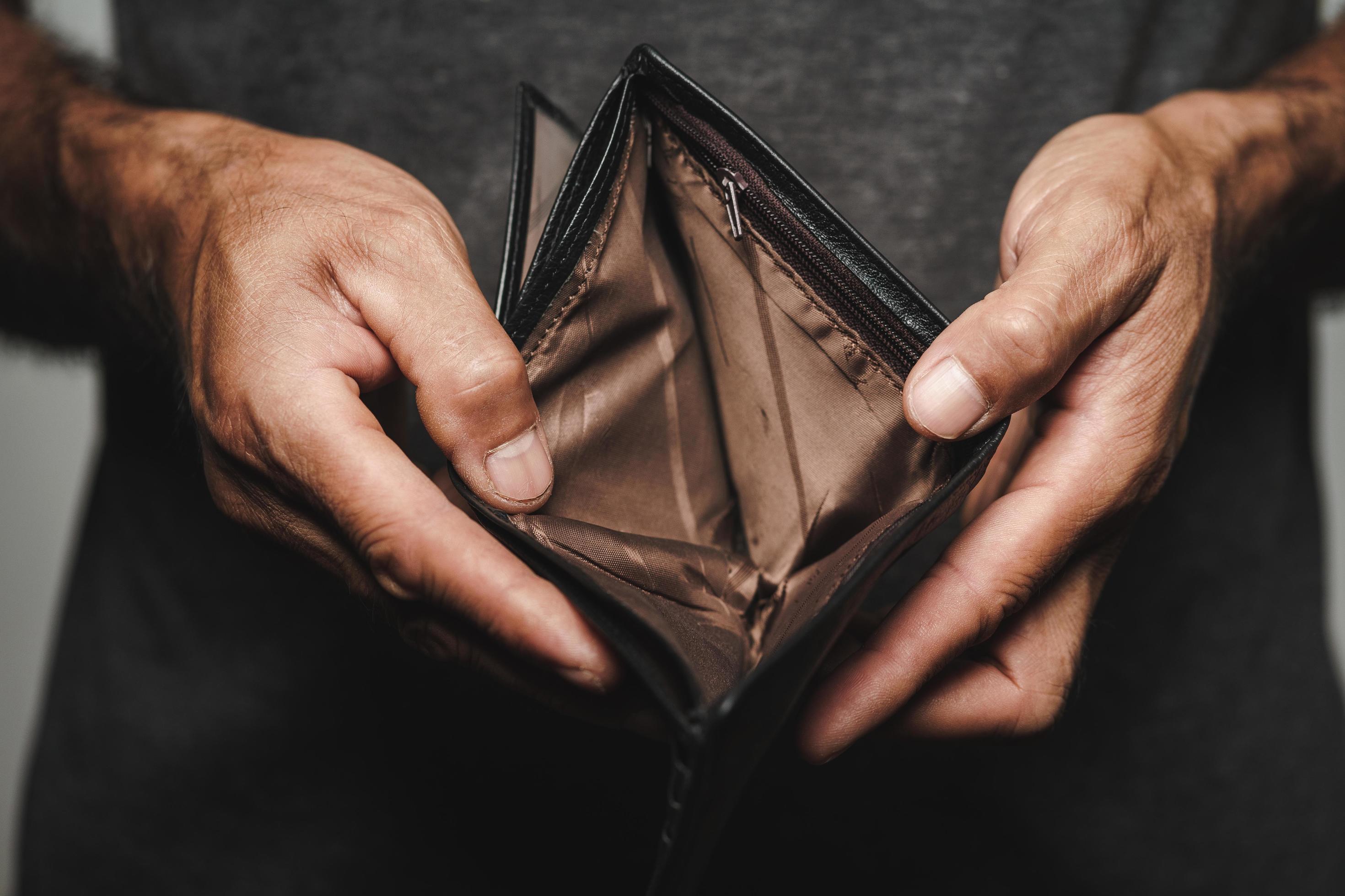 Close up of man hands holding and empty wallet. no money. 3018550 Stock ...
