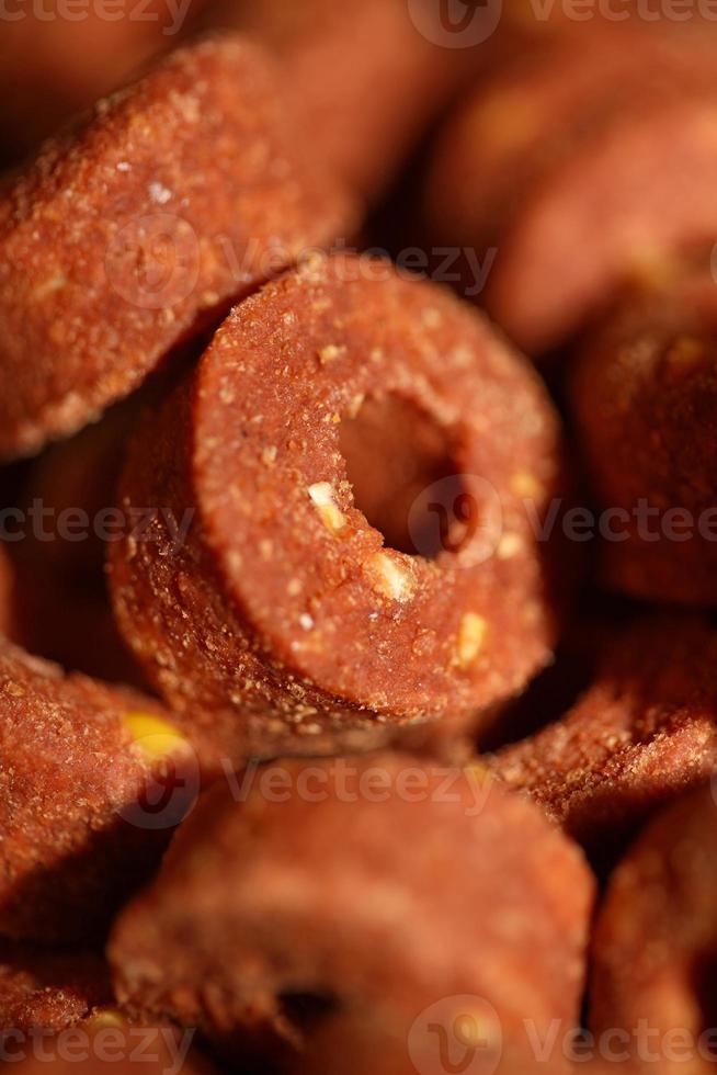 A top view shot of a manufactured dry dog round croquette food prints photo