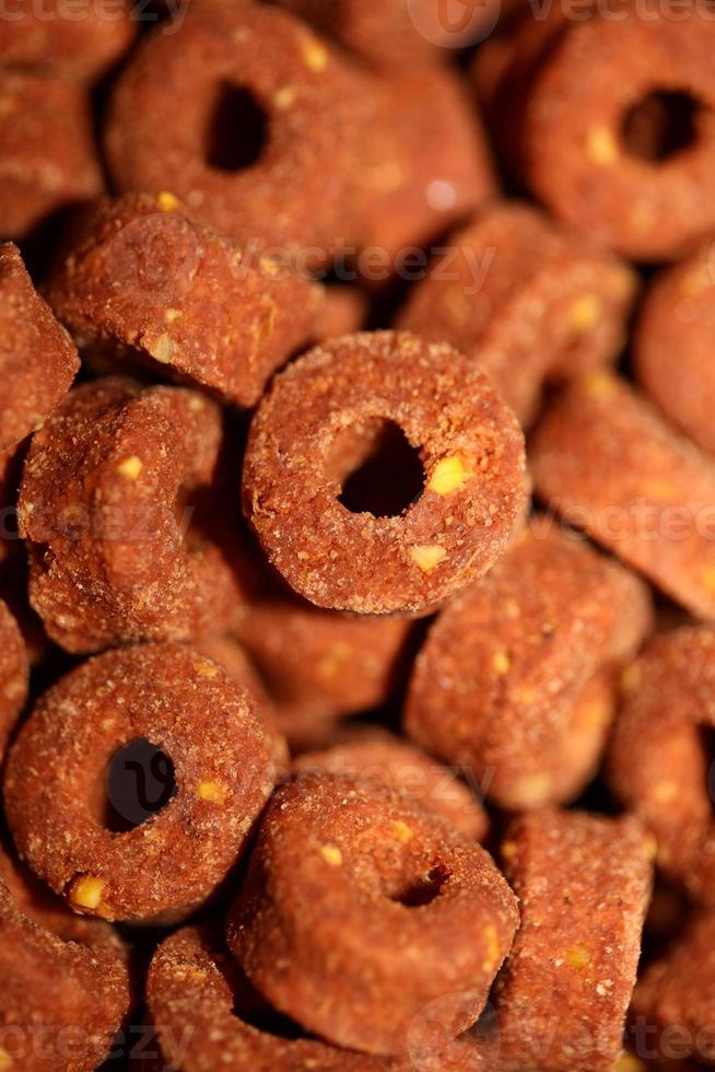 A top view shot of a manufactured dry dog round croquette food prints photo