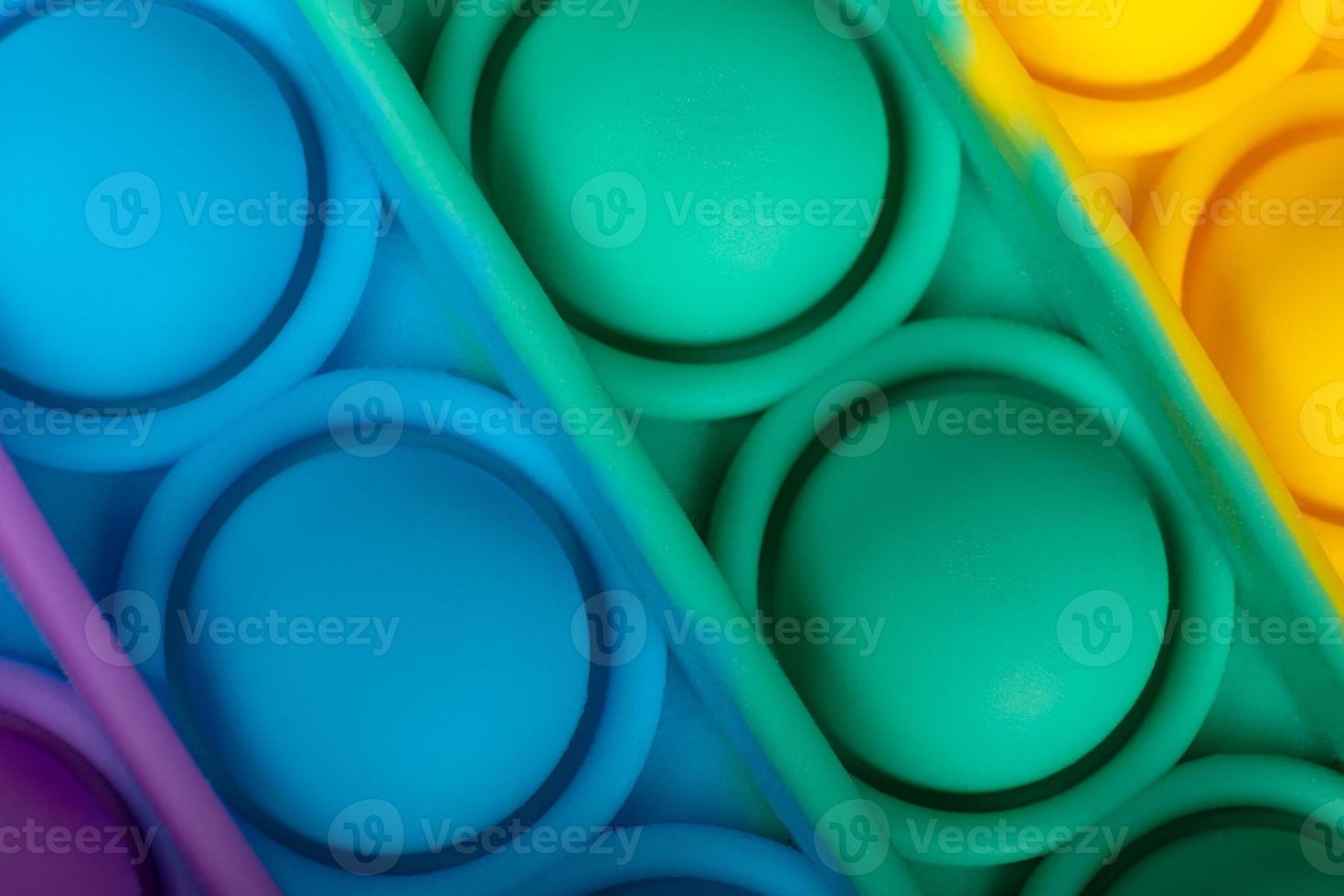 Colorful pop it antistress toy macro close up photo