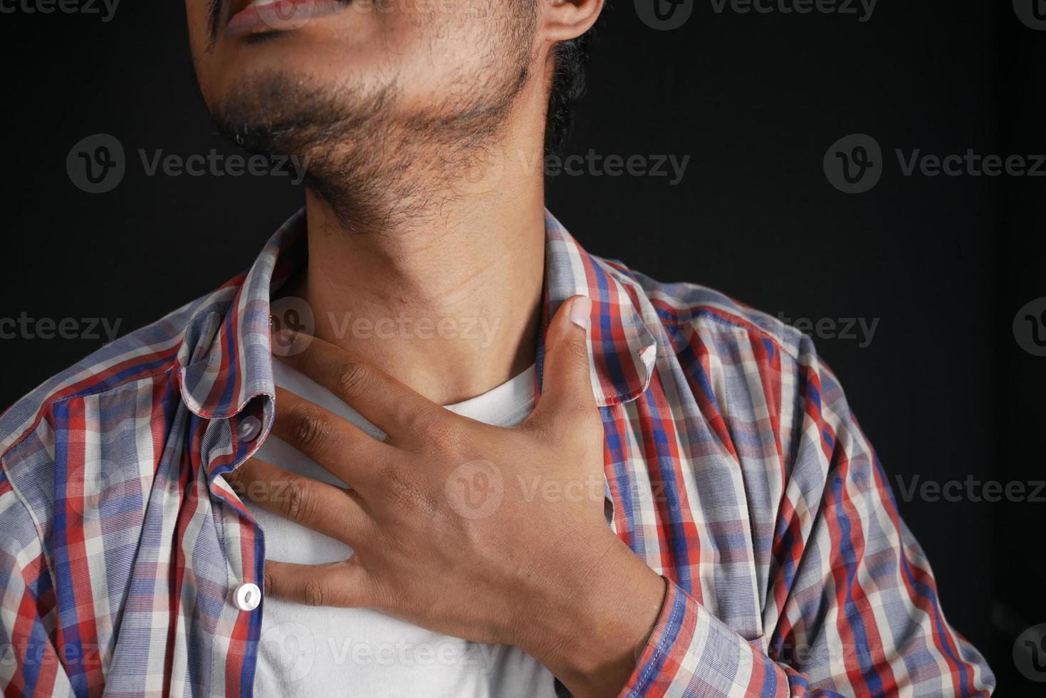 unrecognized man suffering throat pain close up photo