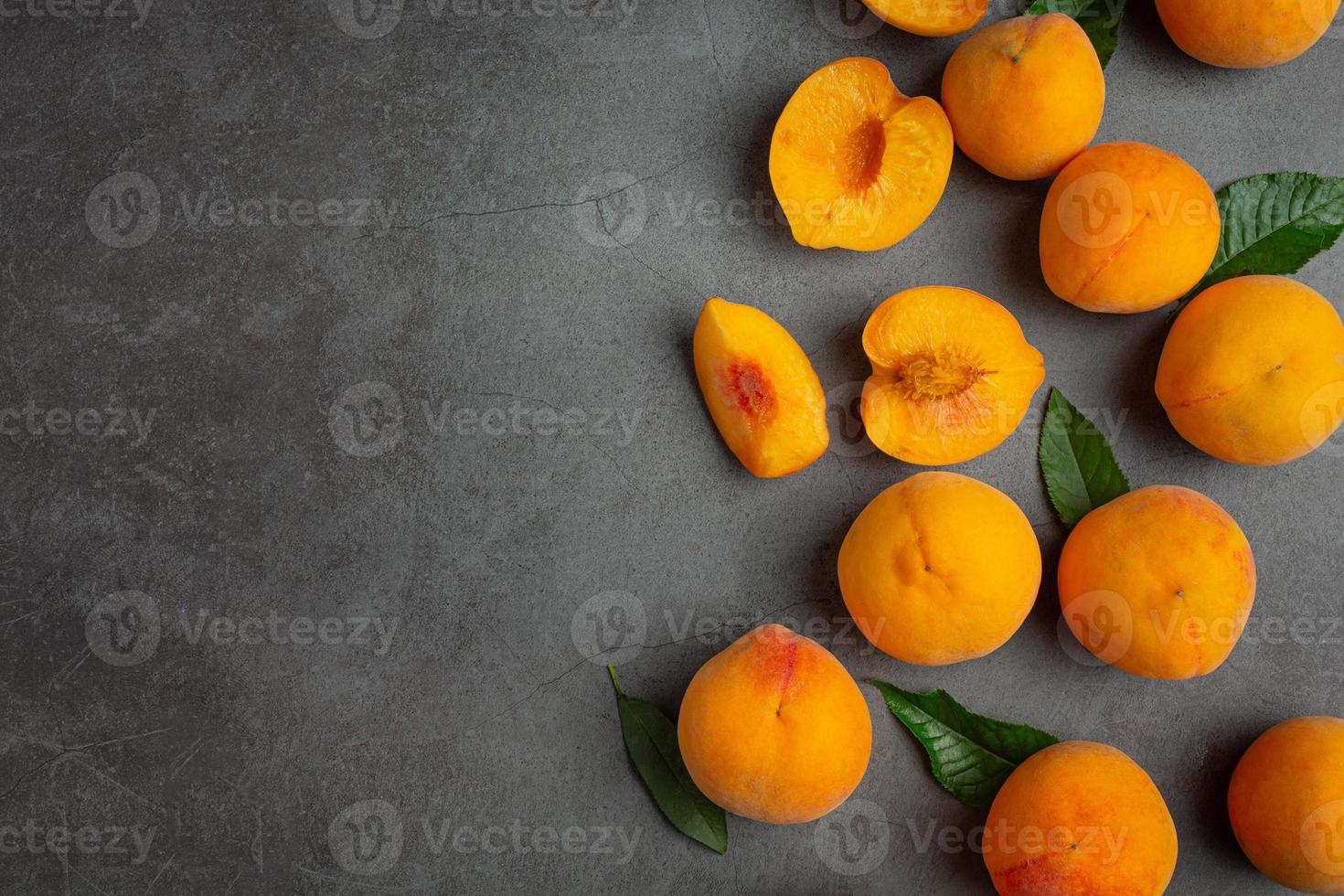 Peaches on a black background photo