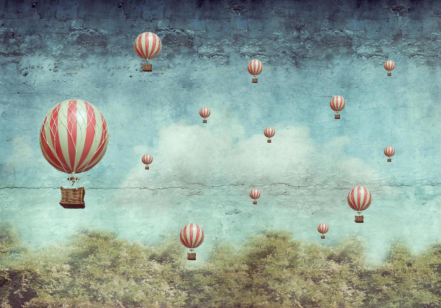 Hot air ballons flying over a forest photo