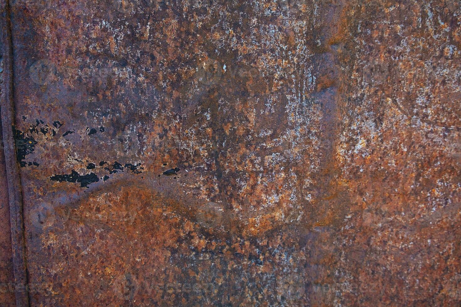 Rust on surface of the old iron photo