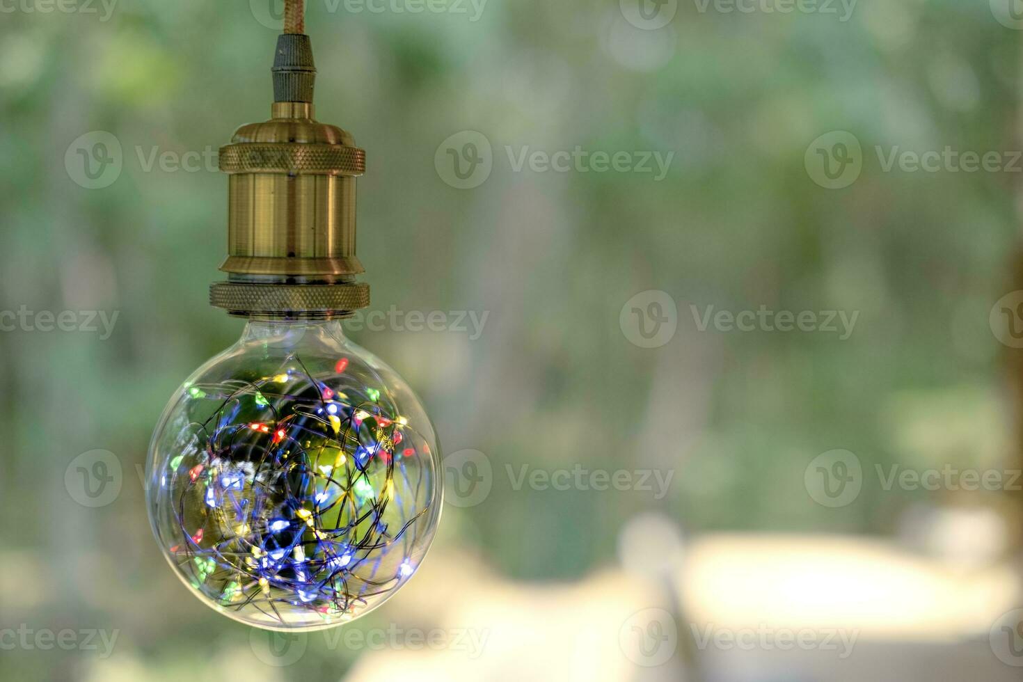 classic retro incandescent led electric lamp on blur background photo