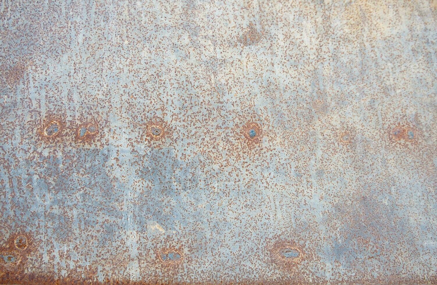 Rust on surface of the old iron photo