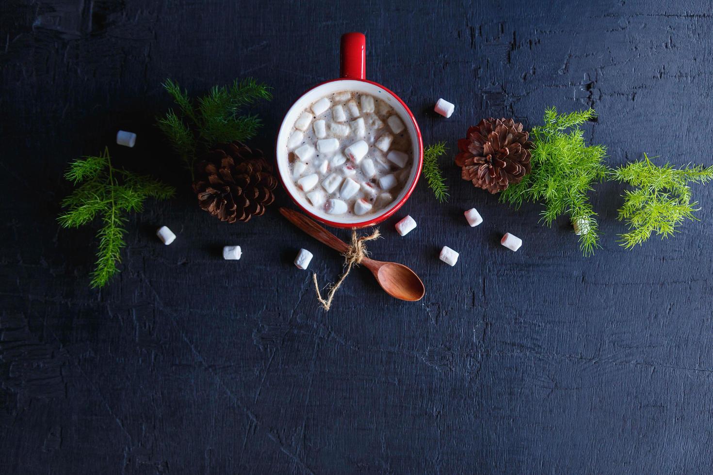 Red hot cocoa cup and gift box on christmas day photo