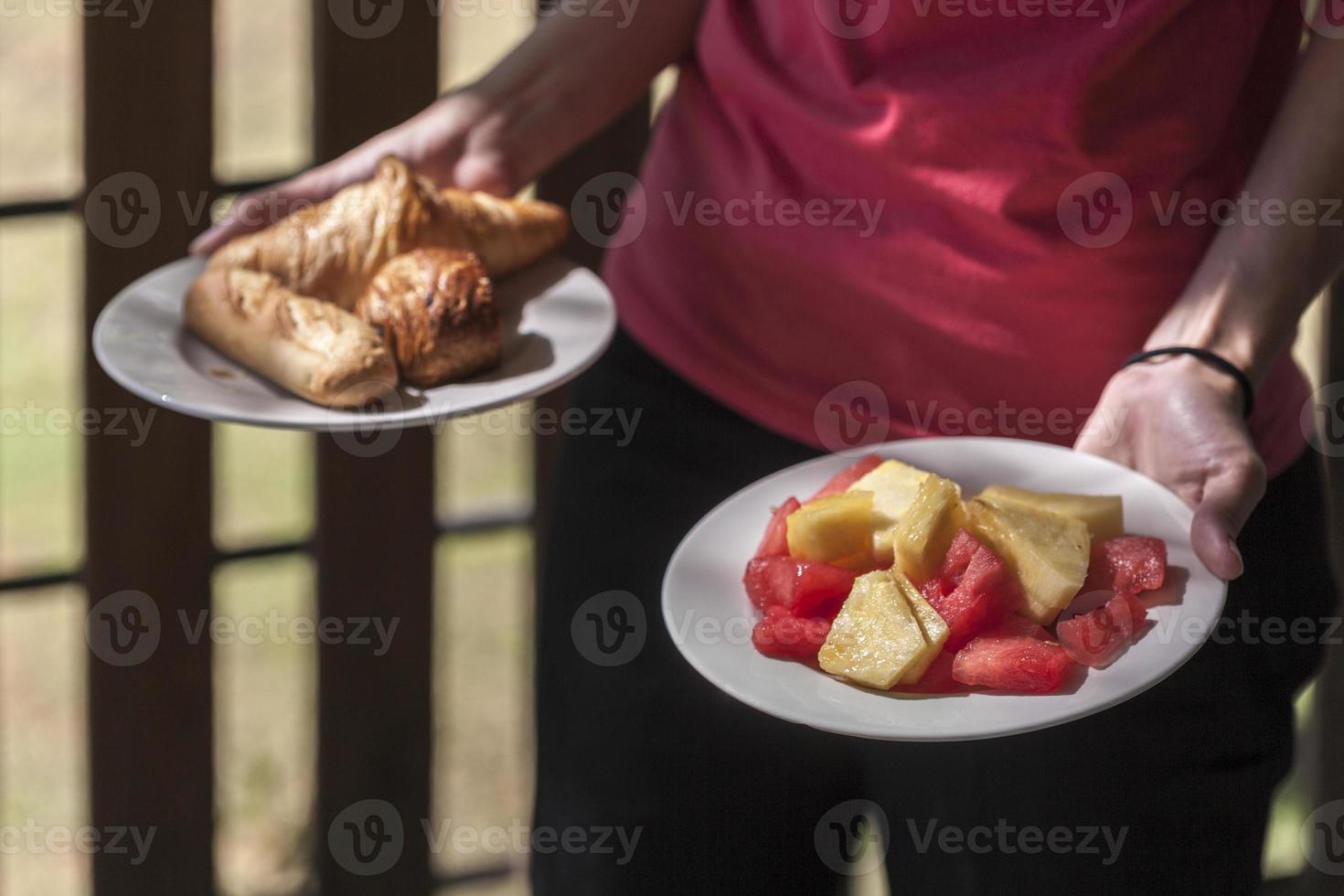 Croissants and fruits for breakfast time, in Francep photo