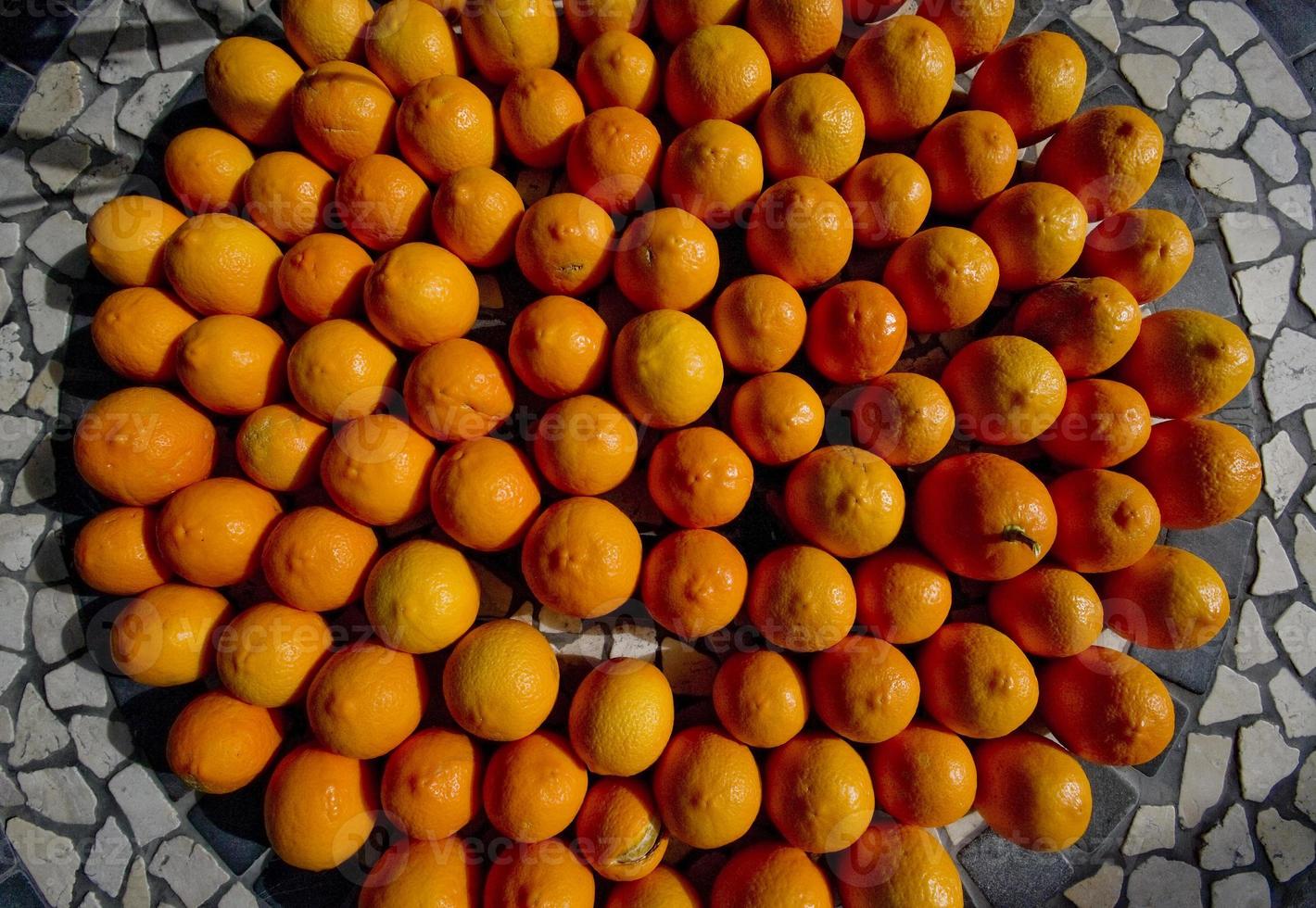 Oranges on the terrace garden table photo